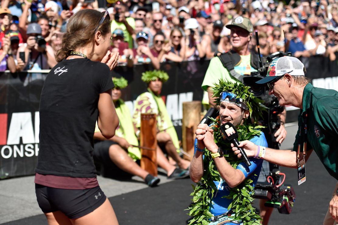 The German proposed to his girlfriend, Julia, at the finish line. 