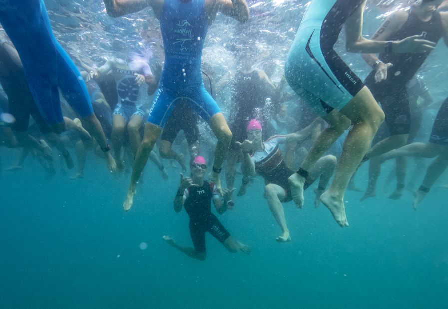 Athletes tread water while they wait for the start of the race. There are multiple categories for different age-groups and abilities. 