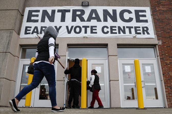 People arrive to vote in Columbus, Ohio, on Wednesday, October 31.