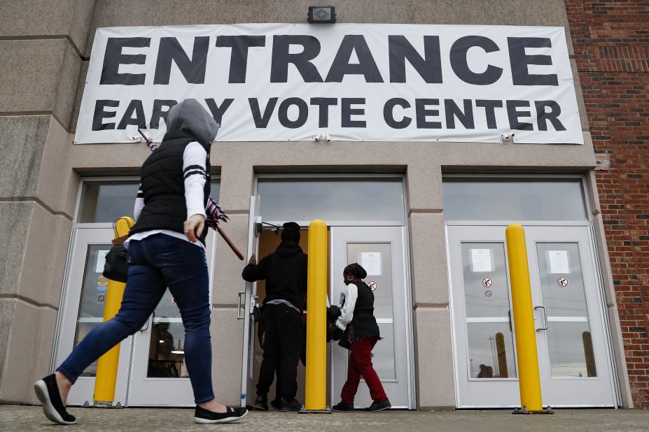 People arrive to vote in Columbus, Ohio, on Wednesday, October 31.