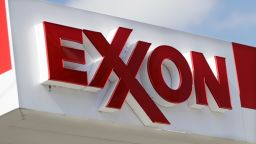 This April 25, 2017, photo, shows an Exxon service station sign in Nashville, Tenn. Exxon Mobil Corp. reports earnings Friday, Feb. 2, 2018. 