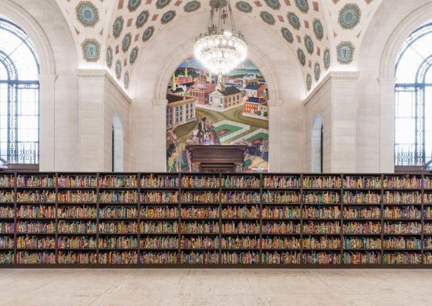 "The American Library," 2018. More than 200 books wrapped in print fabrics and featuring the name of first and second generation migrant American writers form the "The American Library."