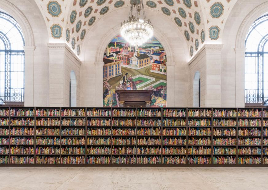 "The American Library," 2018. More than 200 books wrapped in print fabrics and featuring the name of first and second generation migrant American writers form the "The American Library."