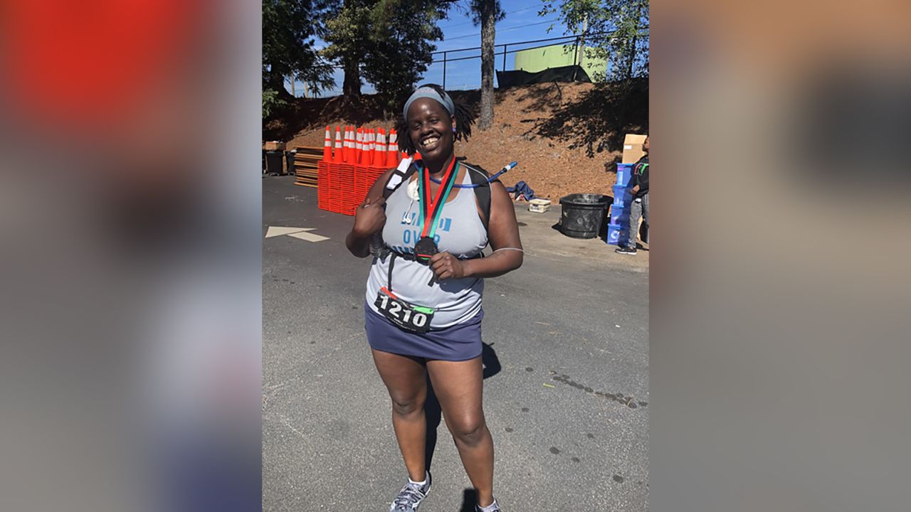 Amina Abdul-Jalil was the final finisher at the 2018 The Race half-marathon in Atlanta.