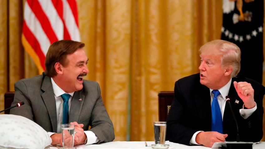 Michael Lindell, with My Pillow, laughs with President Donald Trump during a "Made in America," roundtable event in the East Room of the White House in Washington, Wednesday, July 19, 2017. (AP Photo/Alex Brandon)