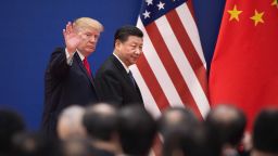 TOPSHOT - US President Donald Trump (L) and China's President Xi Jinping leave a business leaders event at the Great Hall of the People in Beijing on November 9, 2017.Donald Trump urged Chinese leader Xi Jinping to work "hard" and act fast to help resolve the North Korean nuclear crisis, during their meeting in Beijing on November 9, warning that "time is quickly running out". / AFP PHOTO / Nicolas ASFOURI        (Photo credit should read NICOLAS ASFOURI/AFP/Getty Images)