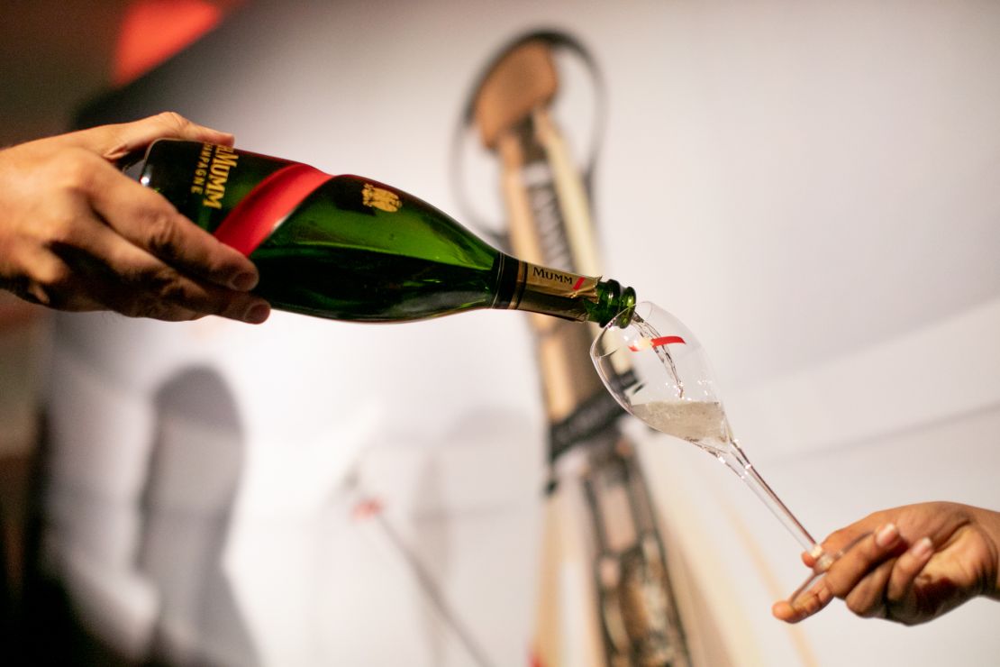 Maison Mumm's birdcage marquee is centered around the celebration of its recent launch of Mumm Grand Cordon Stellar -- the first champange bottle designed for spcae travel.