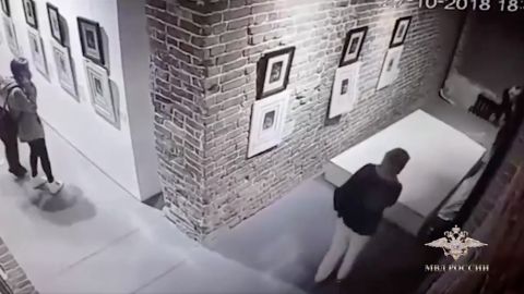 A young woman trying to take a selfie knocked over two works of art at a gallery in Yekaterinburg, Russia, on October 27, 2018. 
