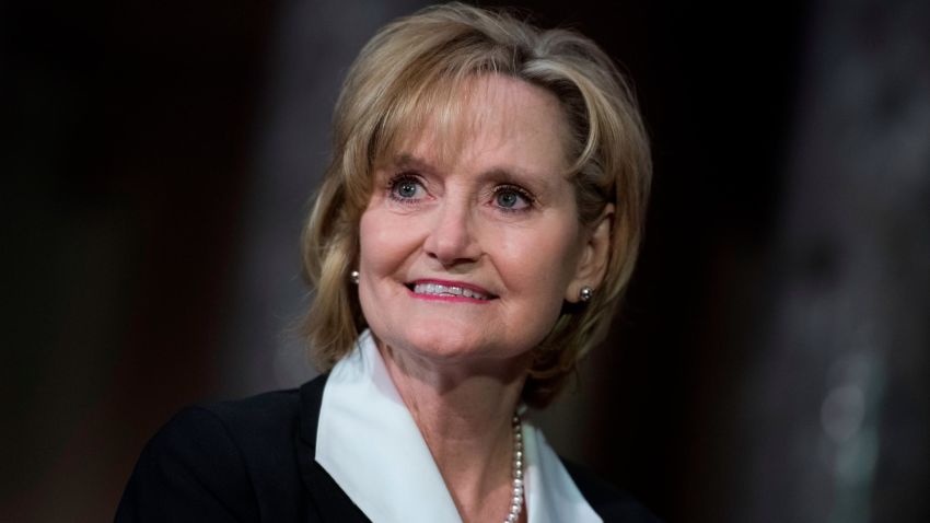 UNITED STATES - APRIL 9: Sen. Cindy Hyde-Smith, R-Miss., attends her swearing-in ceremony the Capitol's Old Senate Chamber after being sworn in on the Senate floor on April 9, 2018. (Photo By Tom Williams/CQ Roll Call)