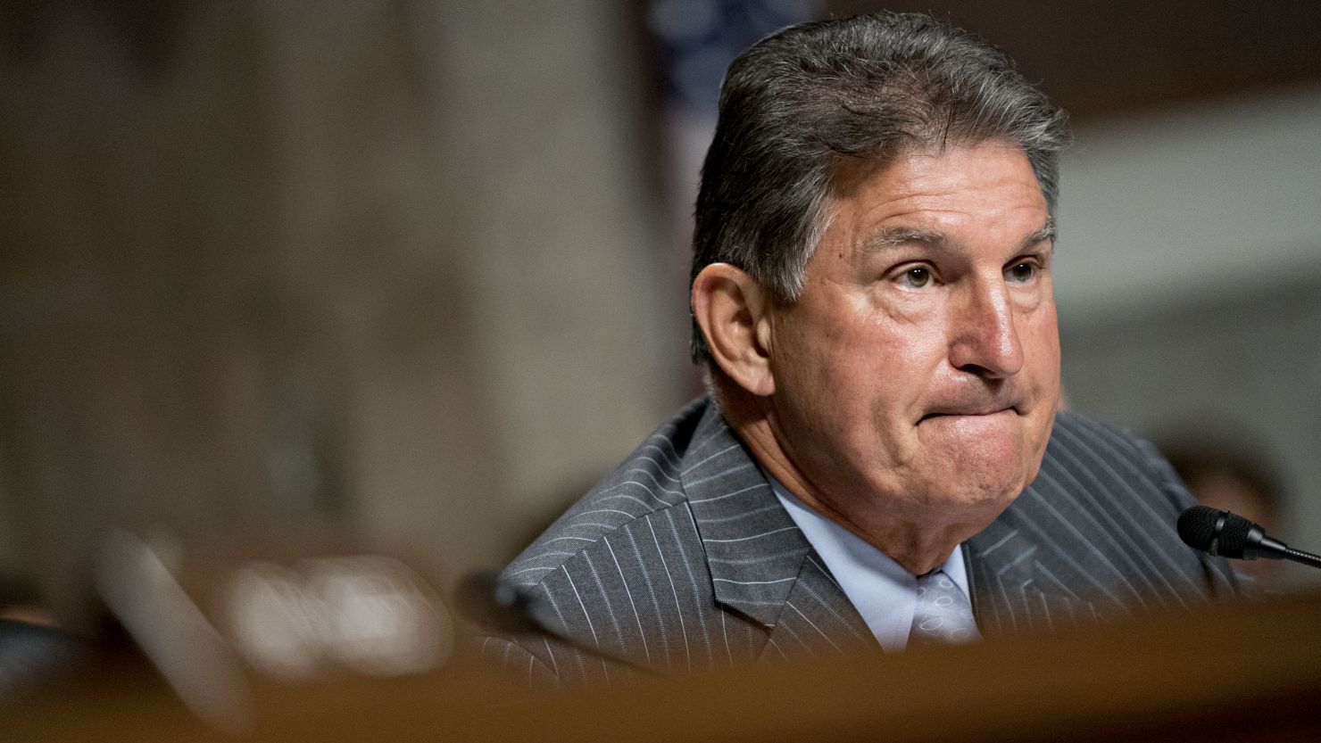 Sen. Joe Manchin, a Democrat from West Virginia, listens during a Senate Intelligence Committee hearing in Washington in September. Photographer: Andrew Harrer/Bloomberg via Getty Images