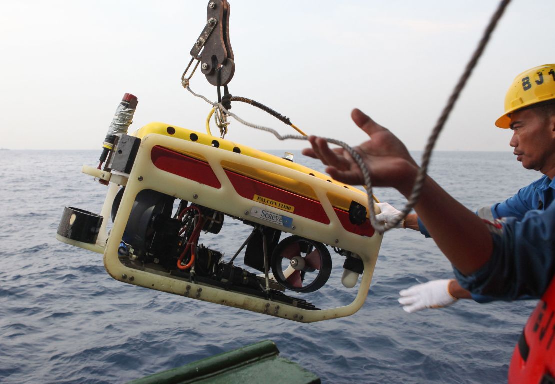 A remotely operated underwater vehicle is prepared for a search of Flight 610's cockpit voice recorder.