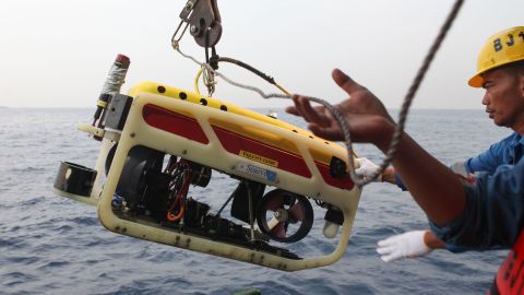 A remotely operated underwater vehicle is prepared for a search of Flight 610's cockpit voice recorder.