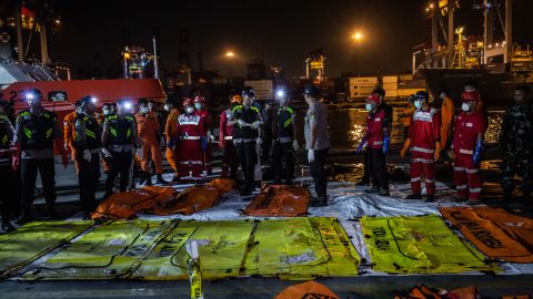 Body bags are laid out at Jakarta's Tanjung Priok port on November 3.