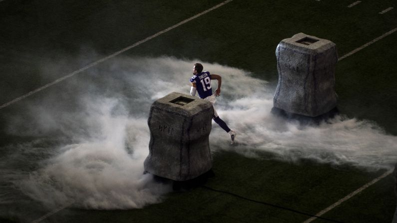 Adam Thielen of the Minnesota Vikings runs out of the tunnel during pregame introductions before a game against the New Orleans Saints on October 28, 2018 in Minneapolis, Minnesota.
