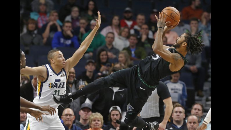 Minnesota Timberwolves' Derrick Rose takes a shot against Utah Jazz's Dante Exum in a game on October 31 in Minneapols, Minn. The oft-injured star scored a career-high 50 points in the game.