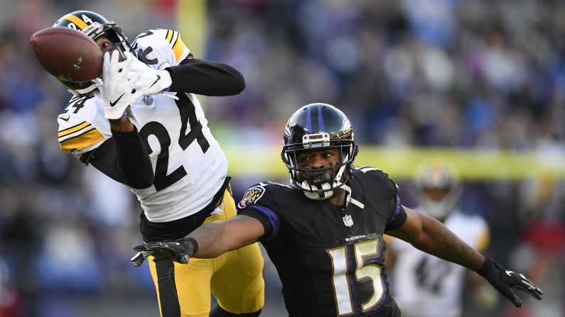 Pittsburgh Steelers cornerback Coty Sensabaugh breaks up a pass to Baltimore Ravens wide receiver Michael Crabtree in the second half of an NFL football game on Sunday, November 4 in Baltimore.
