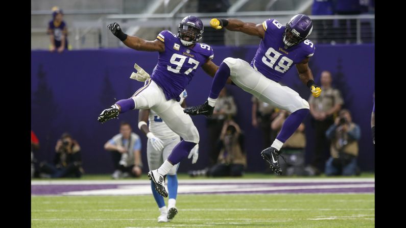 Minnesota Vikings defensive end Danielle Hunter celebrates with teammate Everson Griffen after sacking Detroit Lions quarterback Matthew Stafford during the first half of an NFL football game, Sunday, November 4, in Minneapolis.