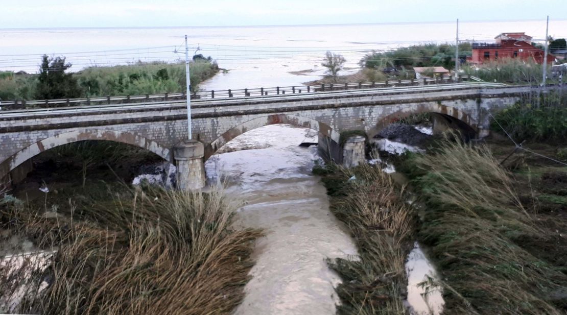 The swollen Milicia river runs in the area where nine people lost their lives when their home was flooded in Casteldaccia, near Palermo, Italy on Sunday, November 4.
