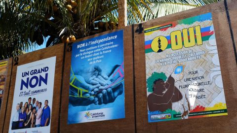 Boards with campaign posters by different political groups favoring or opposing New Caledonia's independence from France are seen during the referendum in Noumea, on the French overseas territory of New Caledonia.