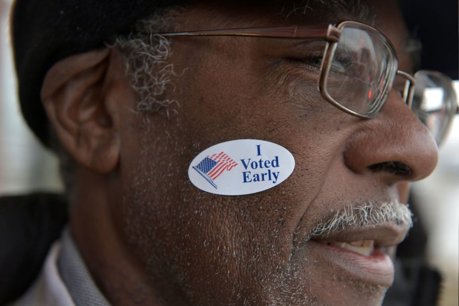 Garry Henning leaves a polling station after voting in Milwaukee on November 4.