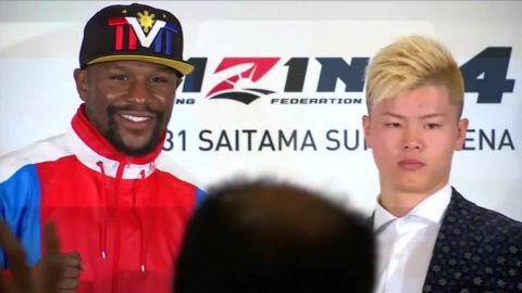 Mayweather and Nasukawa pose during a press event in Tokyo to announce the fight. 