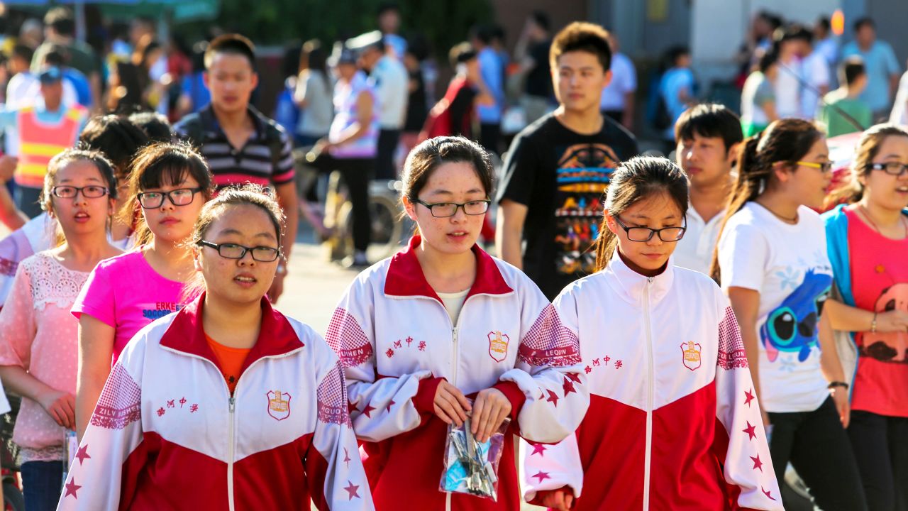 Students in China leave school after finishing their college entrance examination. 