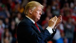 President Donald Trump applauds during a rally at Show Me Center, Monday, Nov. 5, 2018, in Cape Girardeau, Mo.. (AP Photo/Carolyn Kaster)