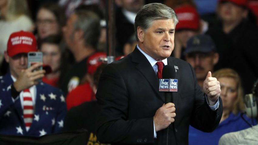 Television personality Sean Hannity does his show from the floor of a campaign rally Monday, November 5, in Cape Girardeau, Mo.