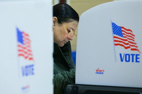 A voter casts her ballot in Glen Allen, Virginia.