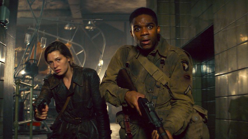 (L-R) Mathilde Ollivier as Chloe, Jovan Adepo as Boyce in the film, OVERLORD by Paramount Pictures