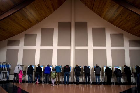 Voters cast ballots at the Century Baptist Church in Bismarck, North Dakota.