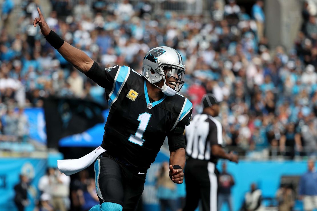 Cam Newton celebrates a Carolina Panthers touchdown against the Tampa Bay Buccaneers on Sunday in Charlotte, North Carolina.