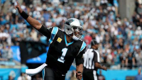Cam Newton celebrates a Carolina Panthers touchdown against the Tampa Bay Buccaneers on Sunday in Charlotte, North Carolina.
