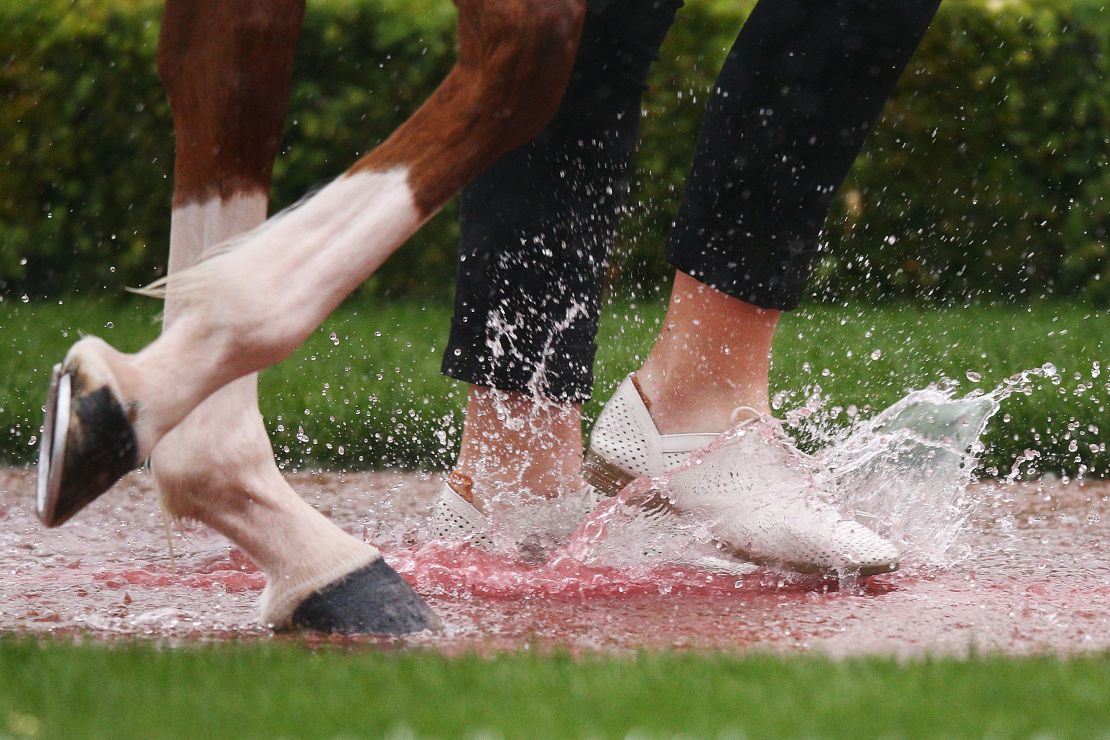 Water builds up in the mounting yard before race 2 during Melbourne Cup Day at Flemington Racecourse on November 6, 2018.