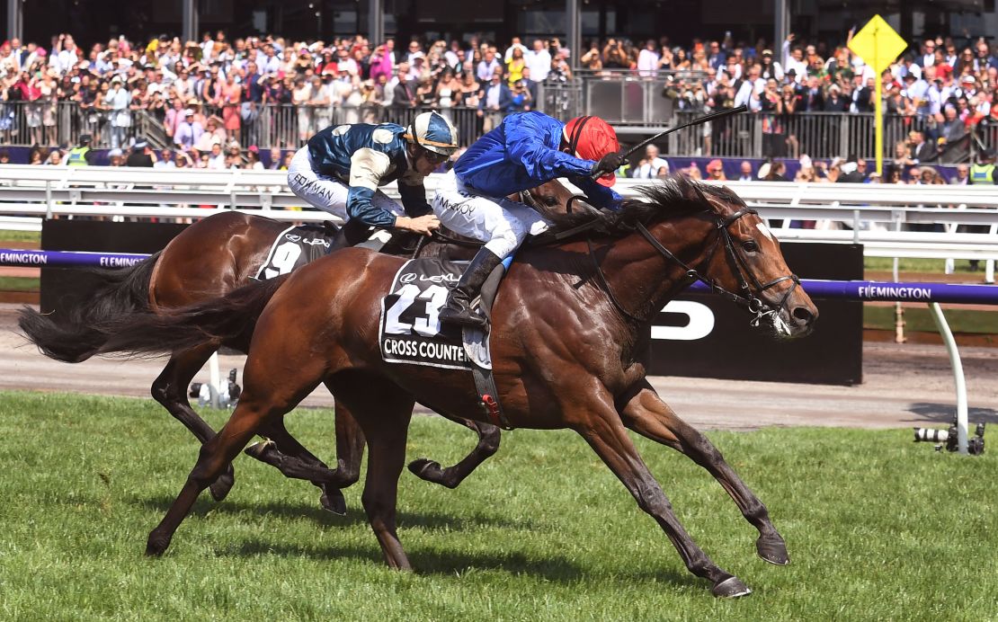 Cross Counter (R) wins the Melbourne Cup ahead of fellow British horse Marmelo. 