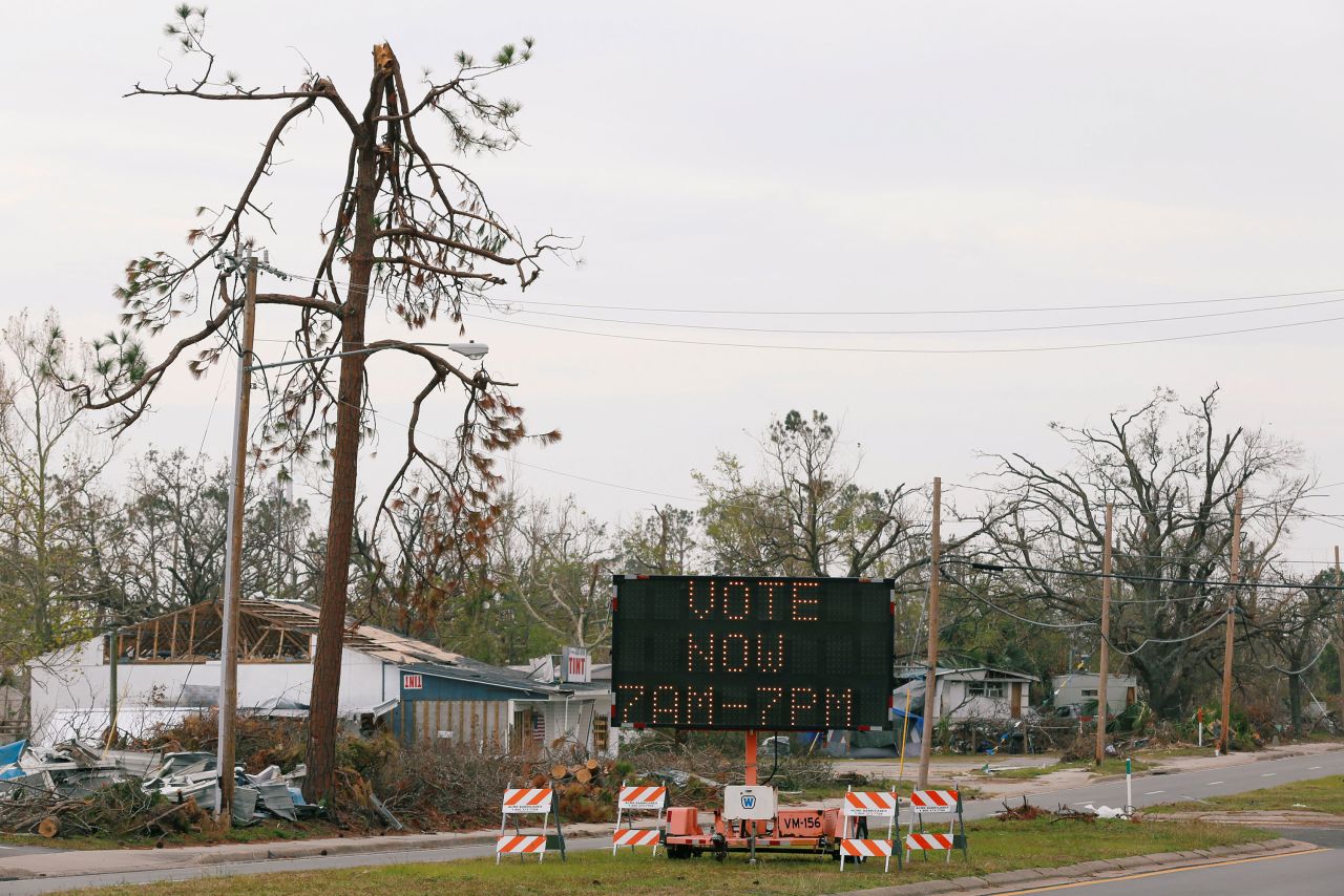 A sign directs voters to a new polling location in Parker, Florida. Hurricane Michael destroyed many schools and other buildings typically used as polling stations.