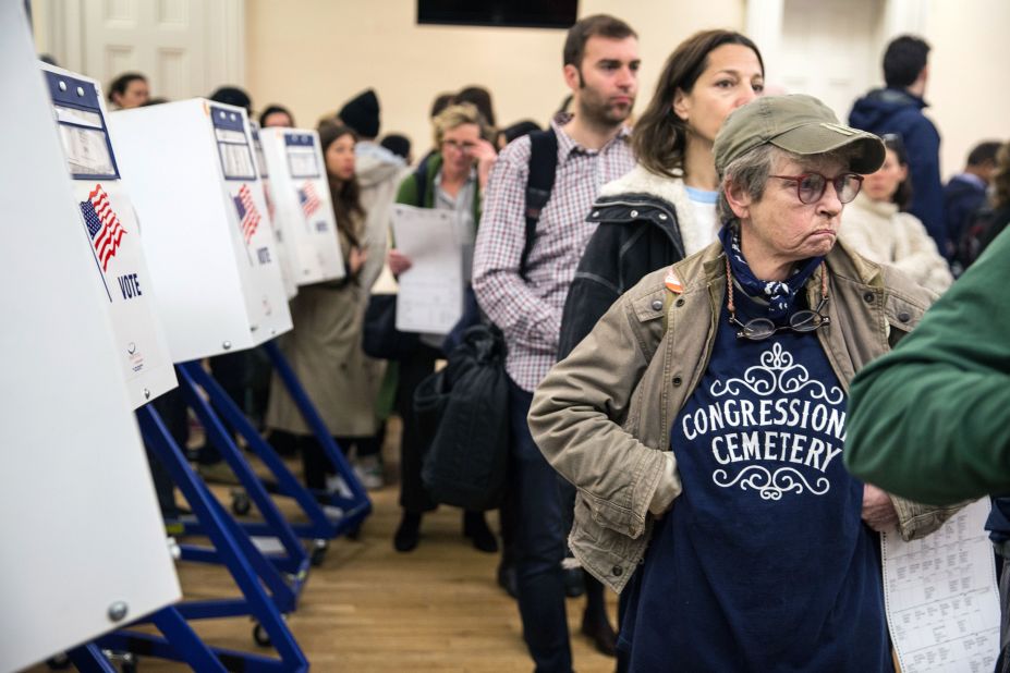 Voters wait in line to cast their ballots in Brooklyn, New York.