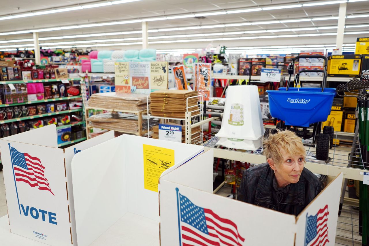 Lynda Klosterman casts her vote at a Theisen's Home & Auto store in Dubuque, Iowa.