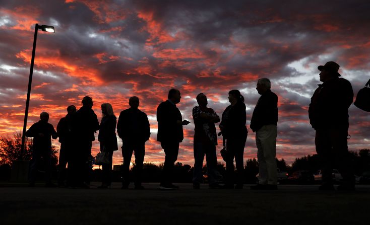 Voters line up shortly before the polls opened in Owasso, Oklahoma.