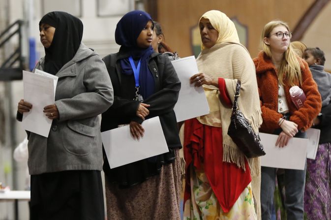 Voters wait in line in Lewiston, Maine.