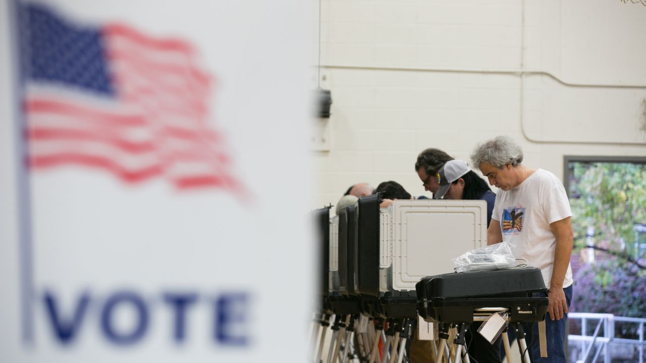 ATLANTA, GA - NOVEMBER 06: Voters cast their ballots at a polling station set up at Grady High School for the mid-term elections on November 6, 2018 in Atlanta, Georgia.   Georgia has a tight race to elect the state's next Governor.  (Photo by Jessica McGowan/Getty Images)