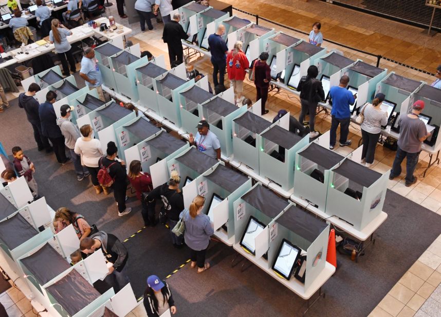 People vote at the Galleria at Sunset, a mall in Henderson, Nevada.