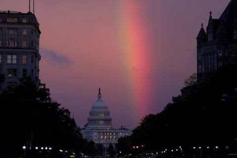 A rainbow forms over the US Capitol as evening sets in on Election Day.