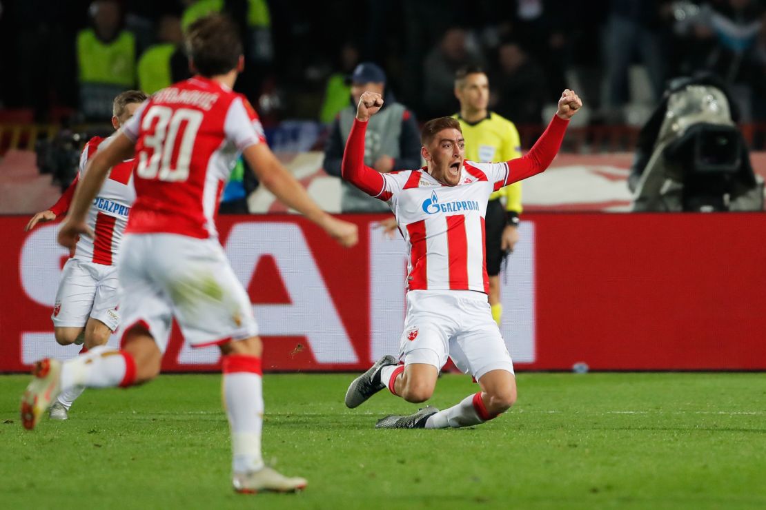 Red Star Belgrade's Serbian forward Milan Pavkov celebrates after scoring against Liverpool.
