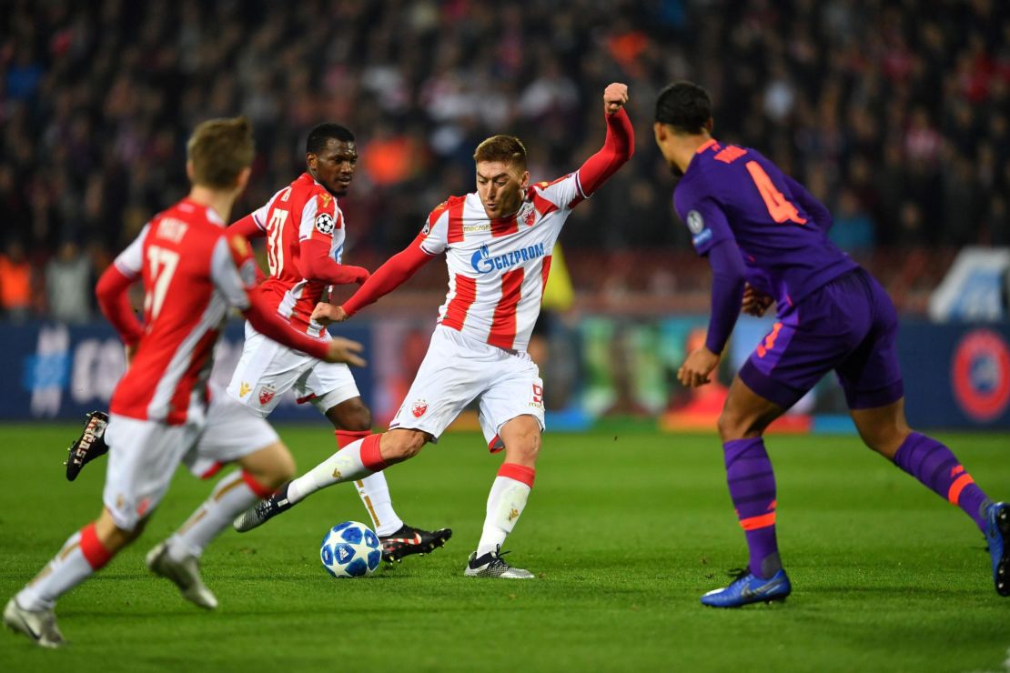 Red Star Belgrade's Milan Pavkov in the process of scoring his second against Liverpool.