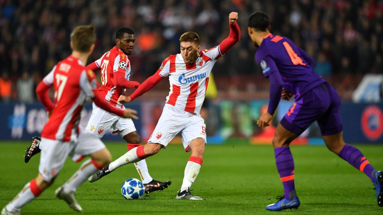 Red Star Belgrade's Milan Pavkov in the process of scoring his second against Liverpool.