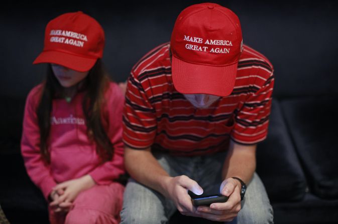 Jake Kriete looks at his phone as he attends an election-night rally in Indianapolis for Mike Braun, a candidate for the US Senate. <a  target="_blank">CNN projected</a> that Braun, a Republican, will defeat Sen. Joe Donnelly.