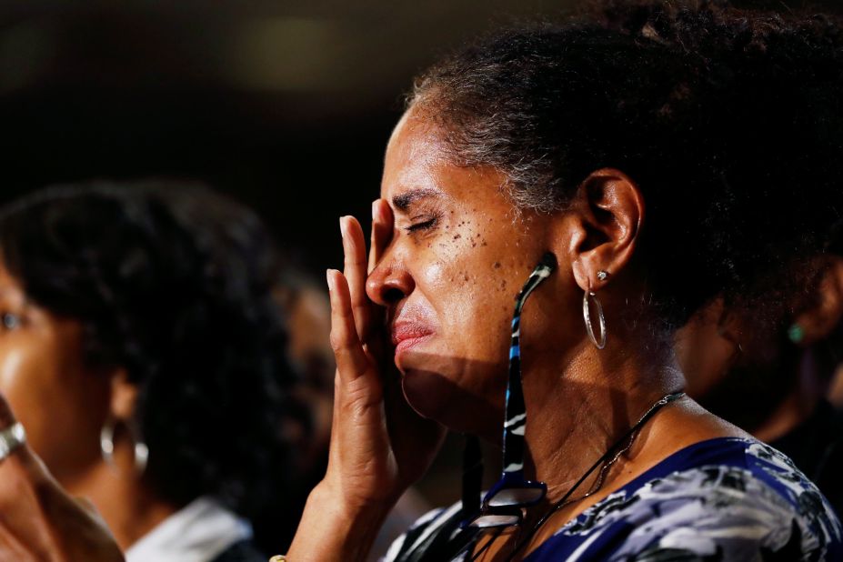 Nina Williams, attending an election-night party for Georgia gubernatorial candidate Stacey Abrams, is overcome with emotion as women sing on stage in Atlanta.