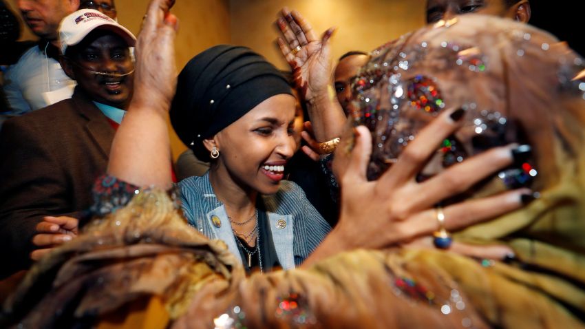 Democratic congressional candidate Ilhan Omar is greeted by her husband's mother after appearing at her midterm election night party in Minneapolis, Minnesota, U.S. November 6, 2018. REUTERS/Eric Miller