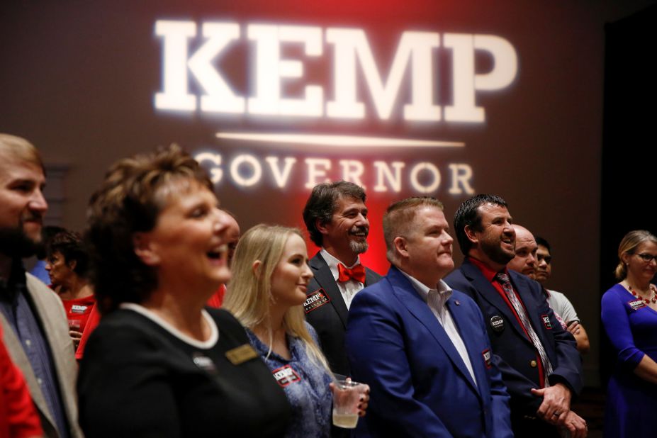 Supporters of Georgia gubernatorial candidate Brian Kemp listen to a speaker as they wait for poll numbers to come in at his election-night party in Athens, Georgia.
